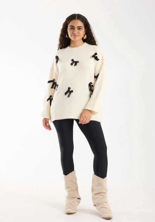 Pull blanc cassé avec Nœuds Satinés Noirs