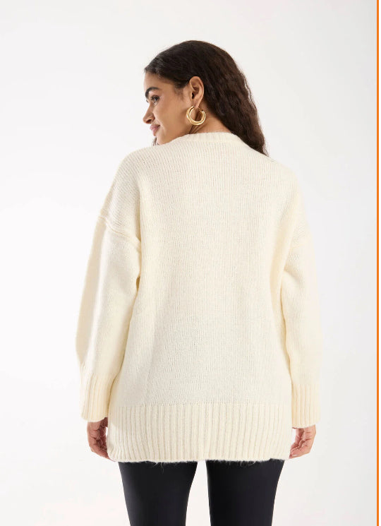 Pull blanc cassé avec Nœuds Satinés Noirs